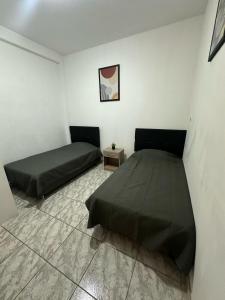 Postel nebo postele na pokoji v ubytování Morada Apart