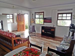 Posezení v ubytování Chalés Van Gogh