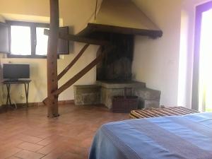 A television and/or entertainment centre at Bicoca - Casaletti