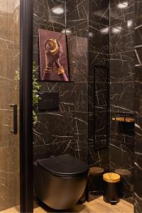 Koupelna v ubytování Euforia - Jacuzzi apartment Ukmergė