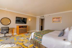Postel nebo postele na pokoji v ubytování Hotel Lucerna Ciudad Juarez
