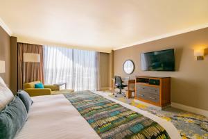 Postel nebo postele na pokoji v ubytování Hotel Lucerna Ciudad Juarez
