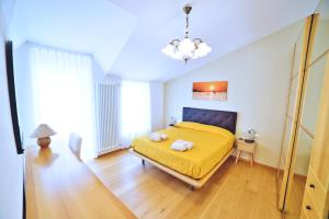 Postel nebo postele na pokoji v ubytování Casa Dalmazia + 15 fotografií