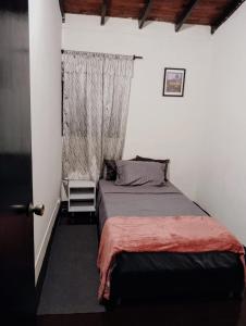 Ένα ή περισσότερα κρεβάτια σε δωμάτιο στο Casa Vintage Cabañitas