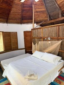 Postel nebo postele na pokoji v ubytování Las Cabañas del Rio + 31 fotografií