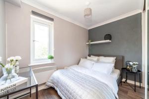 Postel nebo postele na pokoji v ubytování Family home