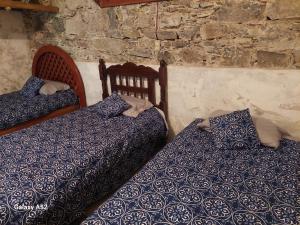 Postel nebo postele na pokoji v ubytování La Casa D'Alick + 6 fotografií