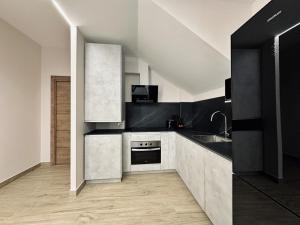 Kuchyň nebo kuchyňský kout v ubytování Flower Deluxe Bajo 2 Dormitorios 6085