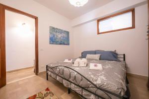 Postel nebo postele na pokoji v ubytování Sicilian Charm close to Taormina - Happy Rentals