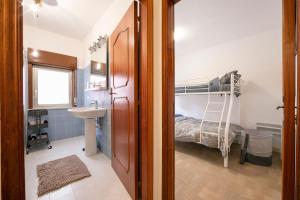 Postel nebo postele na pokoji v ubytování Sicilian Charm close to Taormina - Happy Rentals