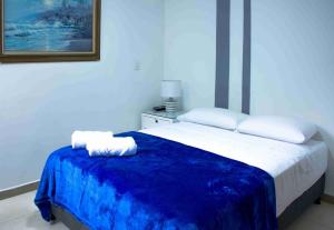 Ένα ή περισσότερα κρεβάτια σε δωμάτιο στο Apartamento Amoblado en la Tebaida +19 φωτογραφίες