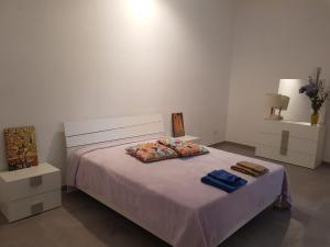 Postel nebo postele na pokoji v ubytování Appartamento Mattinata Corso Matino
