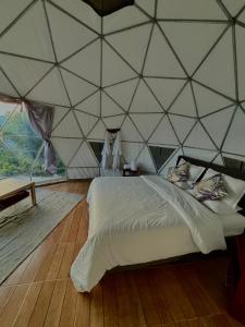 Postel nebo postele na pokoji v ubytování Andino Glamping