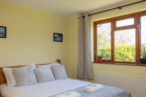 Postel nebo postele na pokoji v ubytování Isabella Place in York - 3 Bed Property, 2 Double Beds, 1 Large Double Bed, Ideal for Families