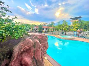 Πισίνα στο ή κοντά στο El Rancho de Willy Piscina juegos y BBQ