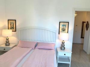 Postel nebo postele na pokoji v ubytování QUEEN HOME Nadia