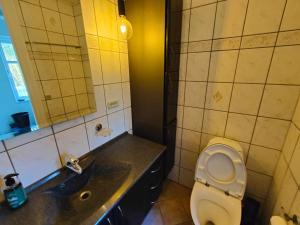 Vannituba majutusasutuses 4 star holiday home in Løkken