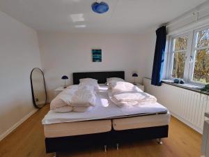 Voodi või voodid majutusasutuse 4 star holiday home in Løkken toas