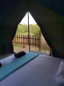 Postel nebo postele na pokoji v ubytování Block 5 Safari Camp - Yala National Park