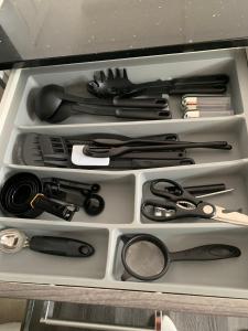 a drawer filled with lots of utensils at Regent Residential House in Whangarei