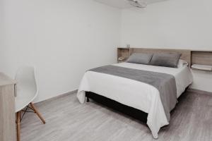 Letto o letti in una camera di Hotel Plataneras Caney