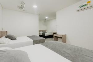 Letto o letti in una camera di Hotel Plataneras Caney