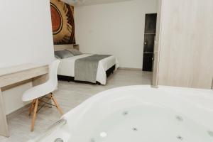 Letto o letti in una camera di Hotel Plataneras Caney