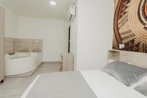 Letto o letti in una camera di Hotel Plataneras Caney