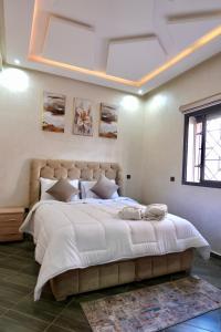 Postel nebo postele na pokoji v ubytování Appartement Marrakech à 5 min de l'Aéroport