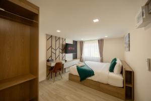 Diff Apartel Banglamphu 객실 침대