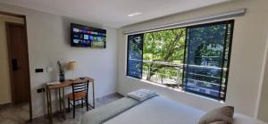 TV a/nebo společenská místnost v ubytování Hotel RUTA365