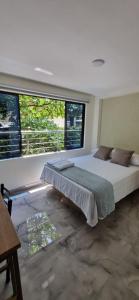 Postel nebo postele na pokoji v ubytování Hotel RUTA365