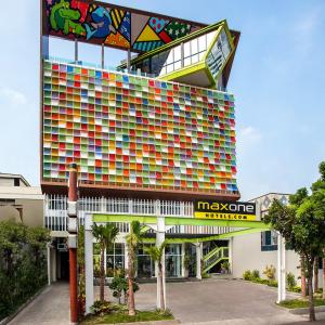 a large building with a lot of colorful windows at MaxOneHotels.com at Tidar in Surabaya