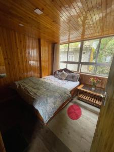 Postel nebo postele na pokoji v ubytování Aamo Homestay