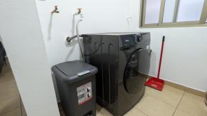a water heater in a corner of a room at Vive Centro Histórico CDMX in Mexico City