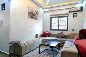 Posezení v ubytování Appartement Marrakech à 5 min de l'Aéroport