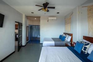 Giường trong phòng chung tại Casa Vista Del Rey