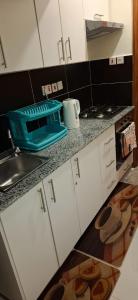 Kuchyň nebo kuchyňský kout v ubytování Luxore Rozina Airport view Apartments, Syokimau + 6 fotografií