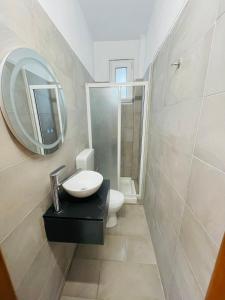 Ένα μπάνιο στο Potos Sunset Rooms +78 φωτογραφίες