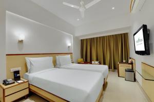 Fotografie z fotogalerie ubytování The Fern Residency Woodland, Pune v destinaci Puné