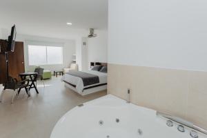 Letto o letti in una camera di Hotel Plataneras Confort