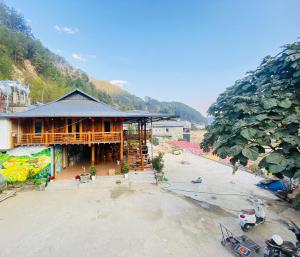 an overhead view of a building on a street at Cô gái thái Homestay in Mù Cang Chải