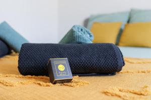 a blue ball of yarn sitting on top of a table at Cosy Nest - parking - Netflix in Valence