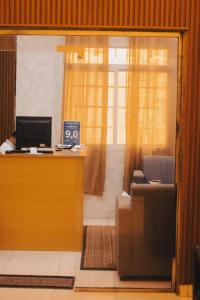 TV a/nebo společenská místnost v ubytování Jawharet Al Kheir Furnished Apartments