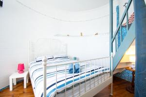 Ένα ή περισσότερα κρεβάτια σε δωμάτιο στο Moulin de Treflez I Plage et Calme