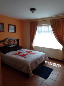 Ένα ή περισσότερα κρεβάτια σε δωμάτιο στο Casa Victoria