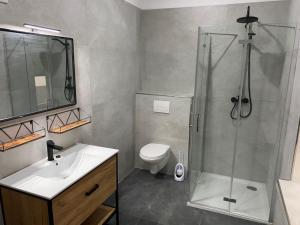 Ένα μπάνιο στο Wohnsol Apartments und Gästezimmer