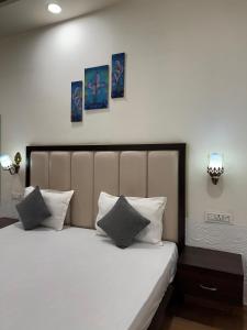 Postel nebo postele na pokoji v ubytování Hotel Sparkle Inn