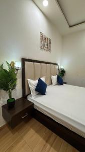 Postel nebo postele na pokoji v ubytování Hotel Sparkle Inn
