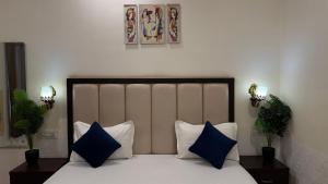 Postel nebo postele na pokoji v ubytování Hotel Sparkle Inn